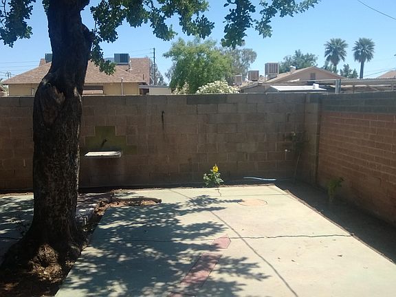 fenced, shaded private rear yard