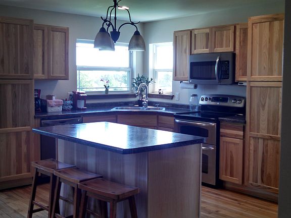 Natural hickory cabinets