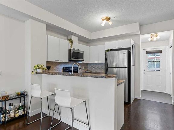 4th image of 2426 W 34th Ave SW #208