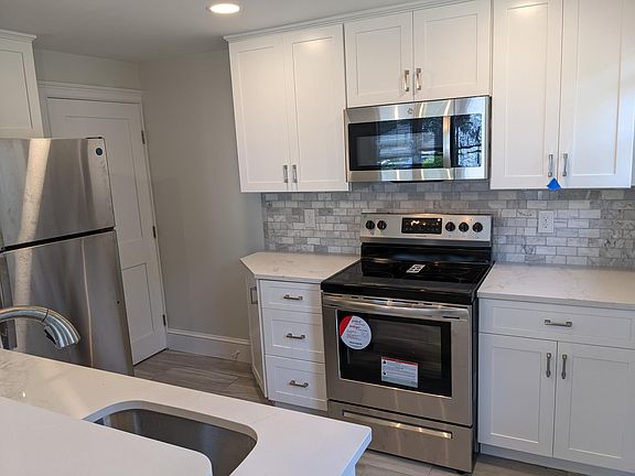 Renovated Kitchen w/shaker cabinets & stainless steel appliances including Dishwasher!