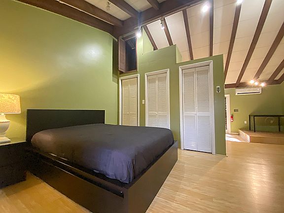 Ample closet space with a bonus space above