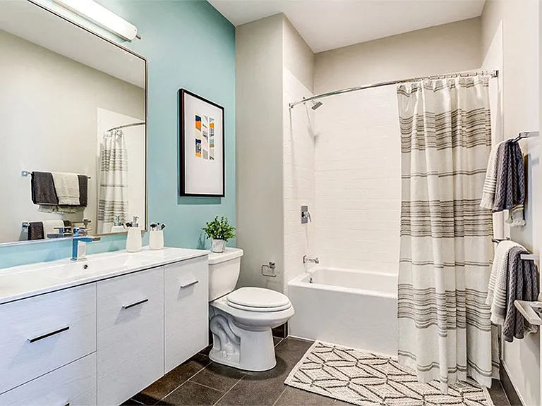 Spa-inspired baths with built-in linen cabinets