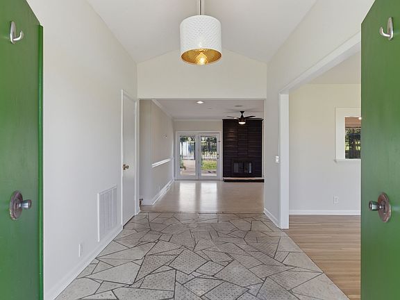 Entry Foyer with slate flooring and updated fixture
