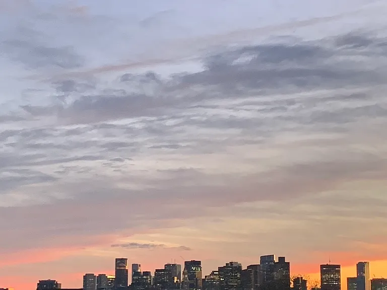 Enjoy sweeping views of Boston from the roof deck