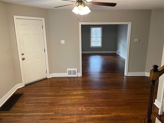 View from kitchen looking to front door and living room