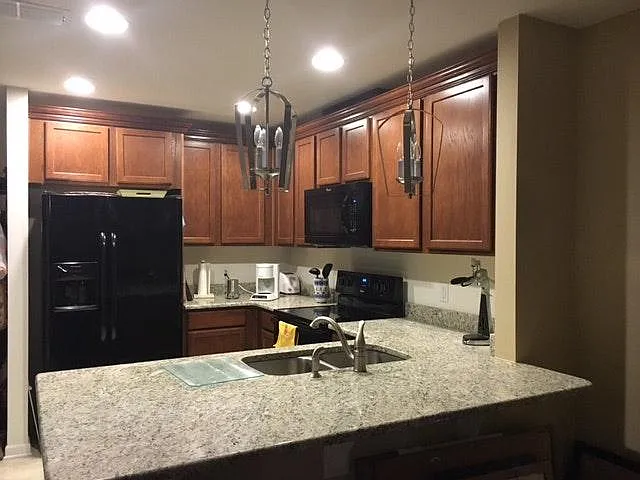 kitchen with granite island and countertops