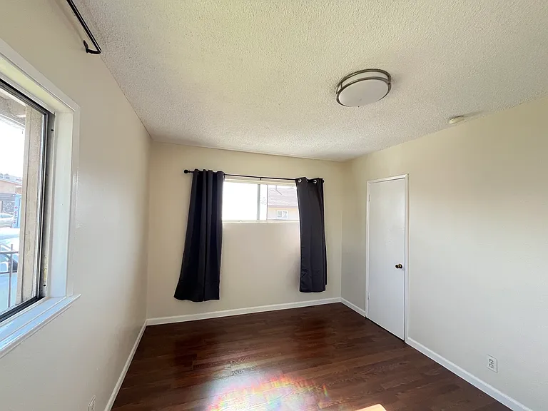new wood floor in bedroom