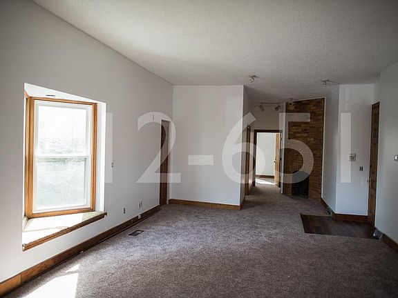 Huge main living room/dining room. Window seat.