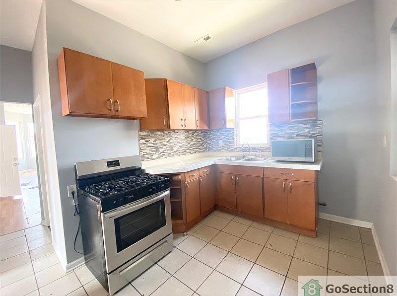1st image of 3221 E 91st St #1