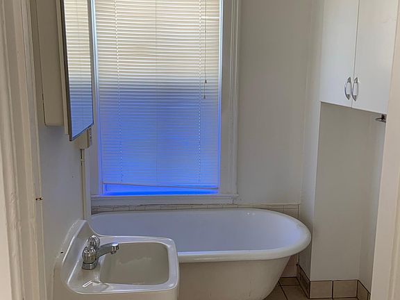 Claw foot tub with shower