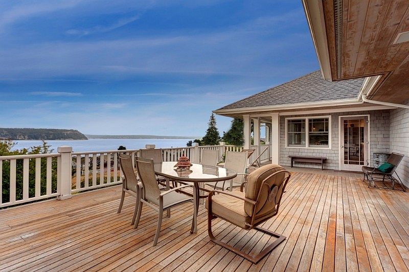 Stunning views of water & mountains from this huge entertaining size deck! Enjoy those large parties (including hot tub) or the initimate dinners too!
