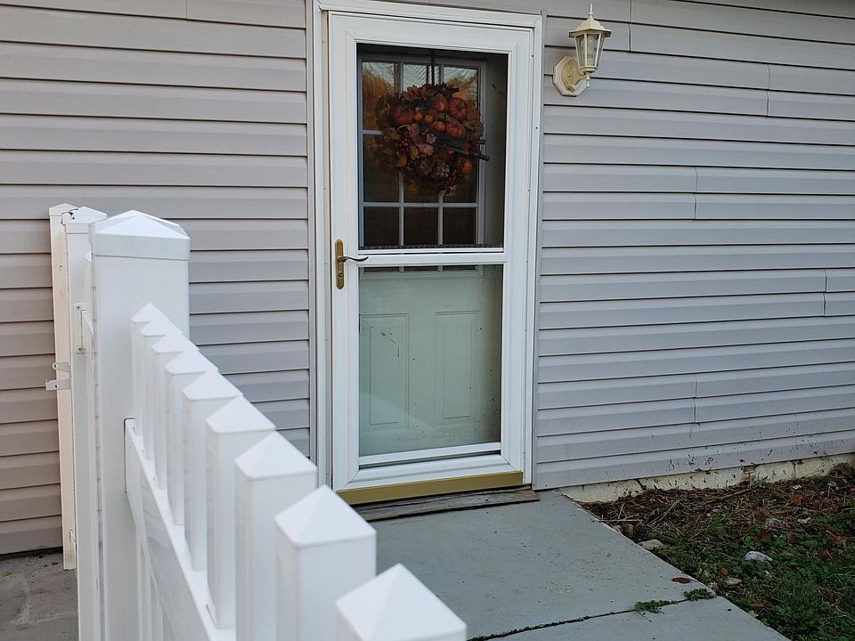 Separate entrance within fenced in yard.