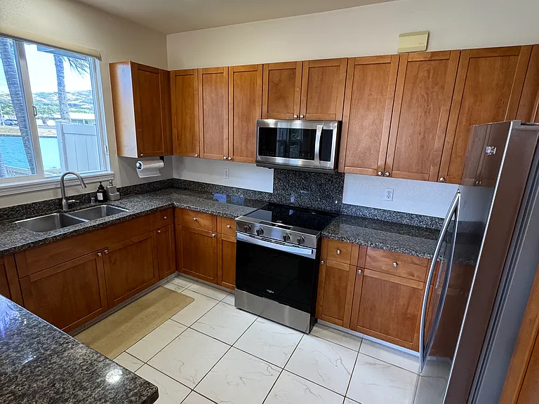 Kitchen with brand new stove.