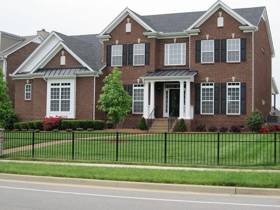 Drive by at night to view the landscape up-lighting on the home