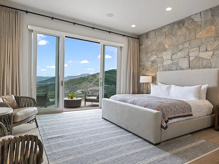 Main level master bedroom with patio