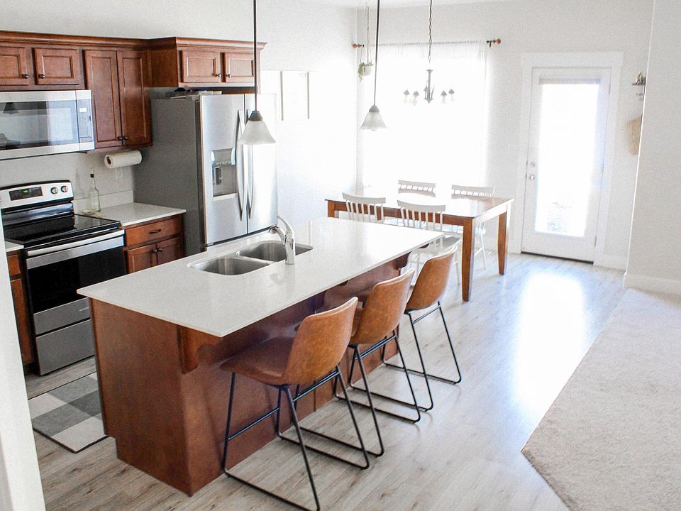 Kitchen and dining room with all appliances included.