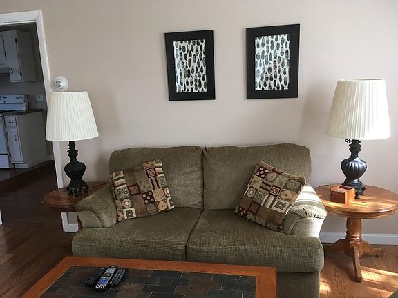 The living room is fully furnished.