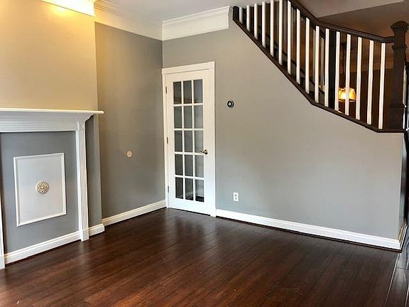 Living room and door to basement