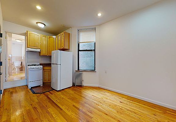 3rd image of 214 E 10th St APT 14