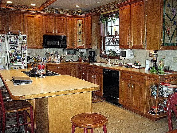 Kitchen island, counters have since been refinished