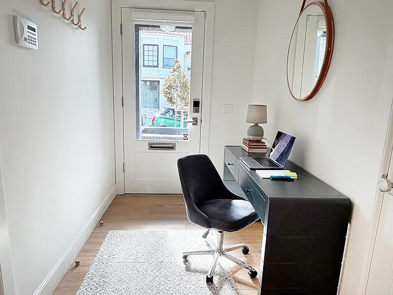 Sunny Work Area with Desk and Swivel Chair