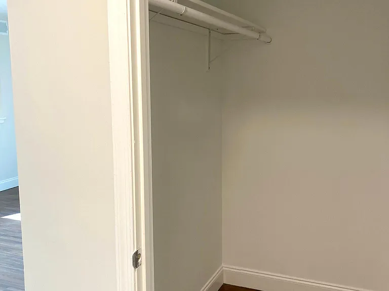 Large walk-in coat / storage closet at entry