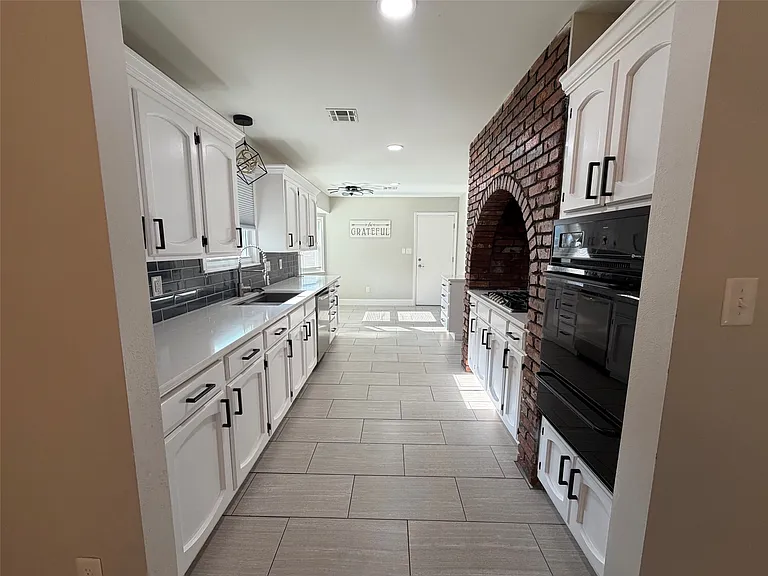 9814 E 37th Ct — Photo 3