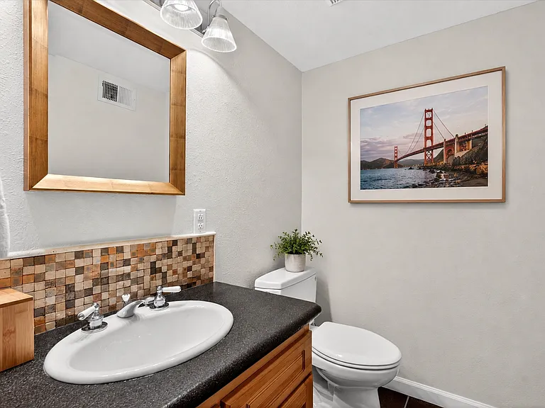 Half bath in multi-use room. Location: downstairs