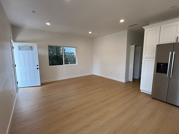 1/2 front room and front door. Recessed lighting.