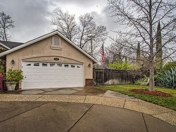 Lot extends to the right of the home