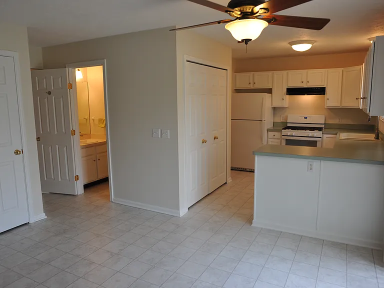 Kitchen, half bath, basement entry