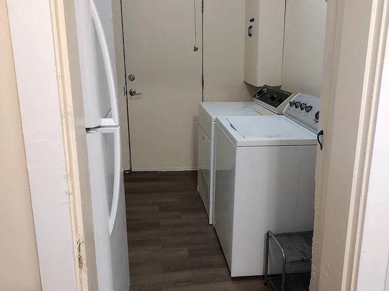 Laundry and back door to off street parking area