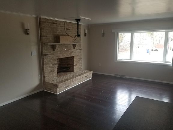 LR - Fireplace w/ Fold-Up Flat Panel TV mount