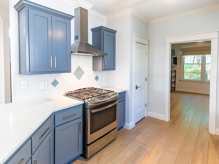 The kitchen connects to the 4th flexible room downstairs.
