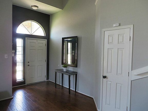 Entry has high ceilings