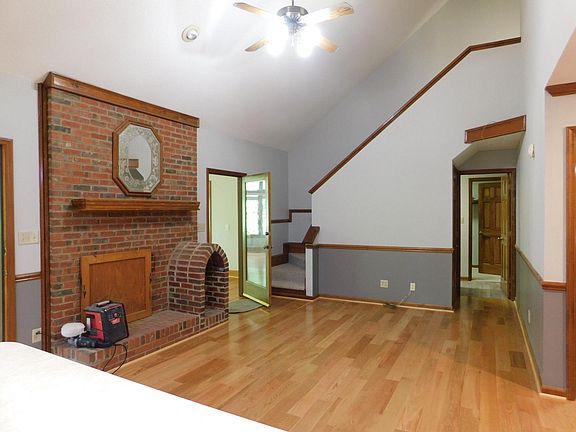 Den w/ new hardwood flooring - View from Kitchen.