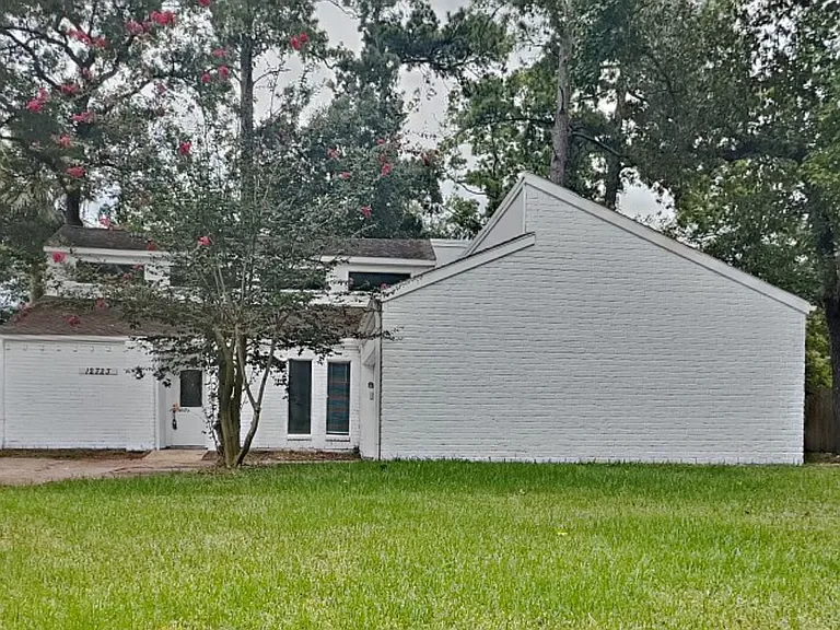 A charming white house nestled