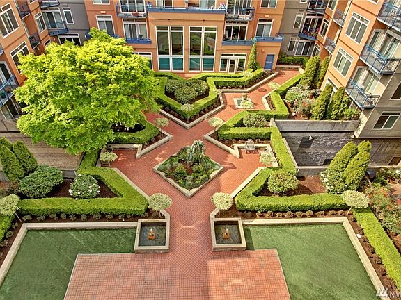 Stunning corner balcony unit overlooking the peaceful courtyard.