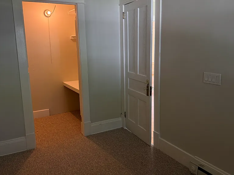 bedroom w/ walk in closet