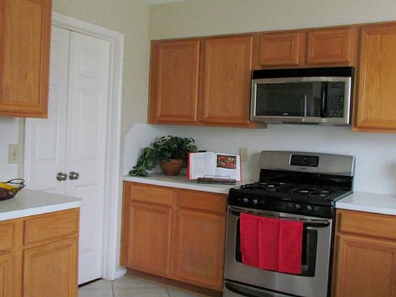 Ceramic tile floors, stainless steel appliances.