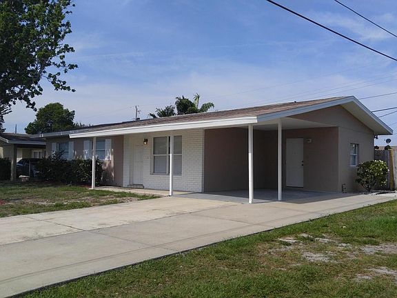 Oversized driveway. 1 car carport.