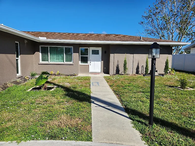 two car garage and circular driveway