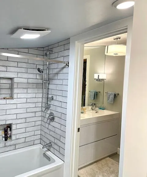 Separate bath and vanity areas