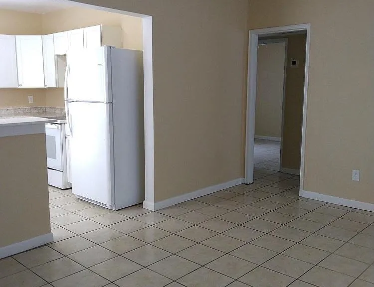 View from Living Room into Kitchen Entry