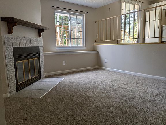 Family room. (Appliances in the background have been replaced with new stainless steel appliances)