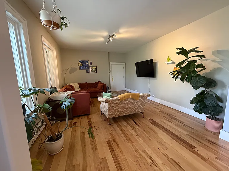 Living Room looking towards apartment entrance.