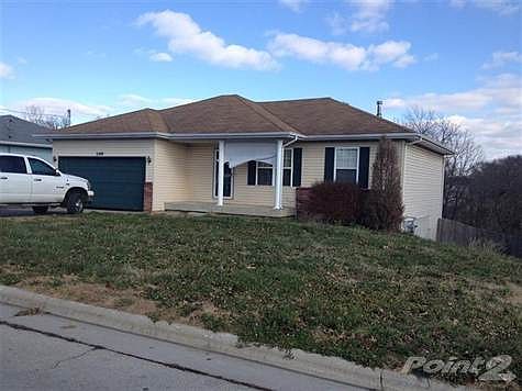 Cute Walkout Basement home on large lot that backs up to trees!