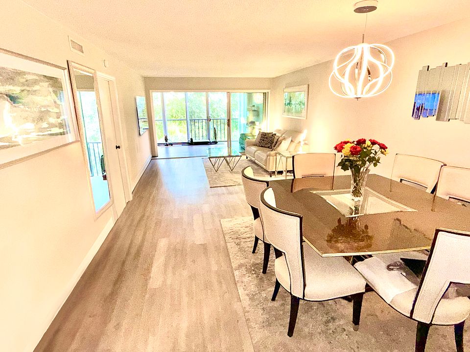 Spacious Dining and Living room in off white and contemporary elegant furnishing