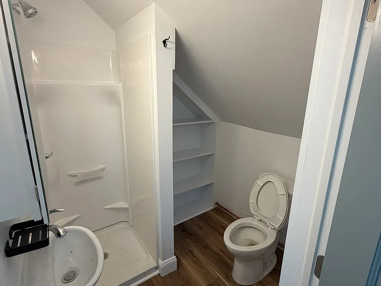 Bathroom - small but note shelves for towels.