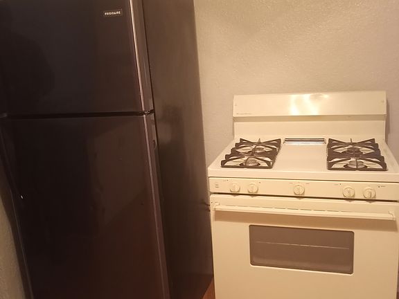 Stove, dishwasher, refrigerator.